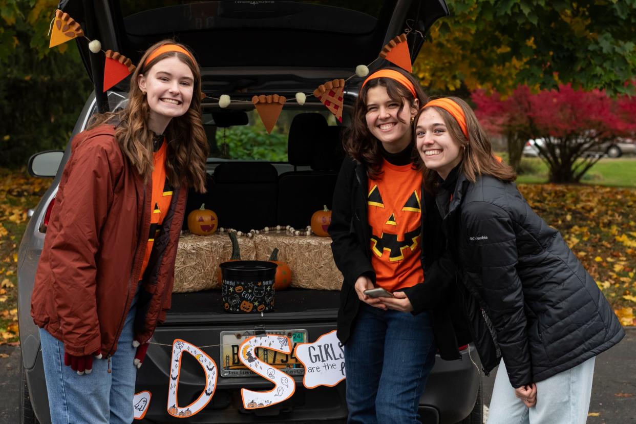 Hillsdale College students pose for a photograph during their fourth annual Trunk-or-Treat.