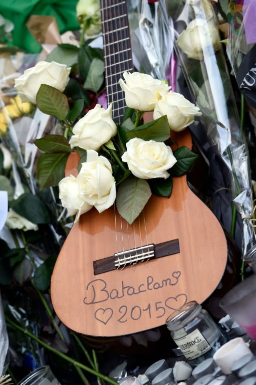 A guitar at a memorial along the police cordon close to the Bataclan concert hall on November 15, 2015