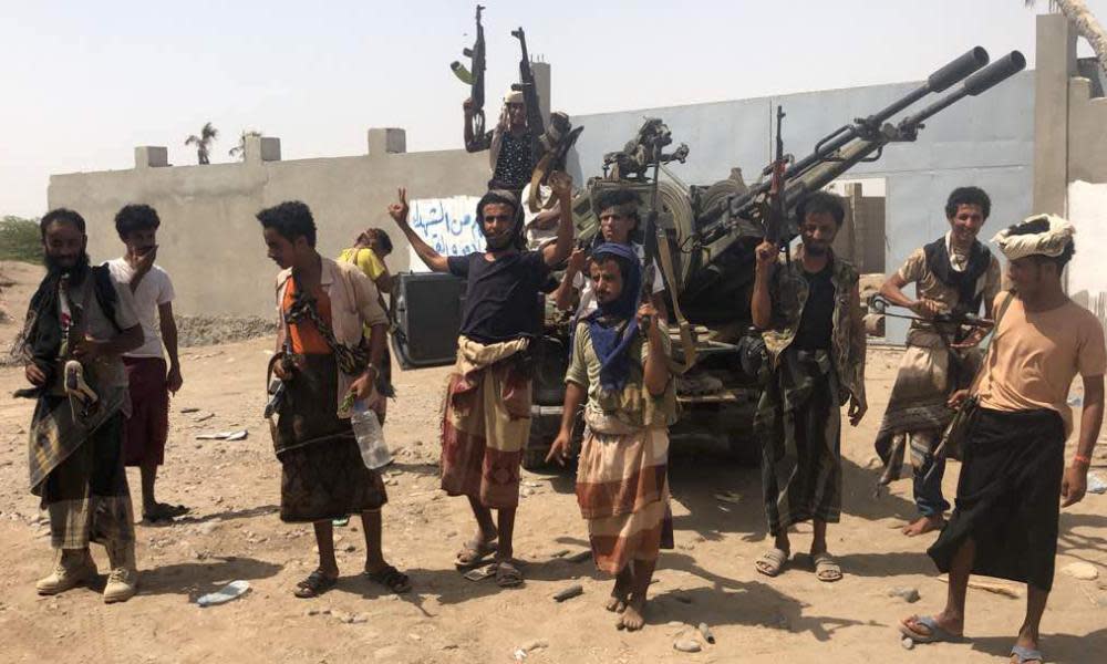 Yemeni pro-government forces gather during their fight against Houthi rebels.