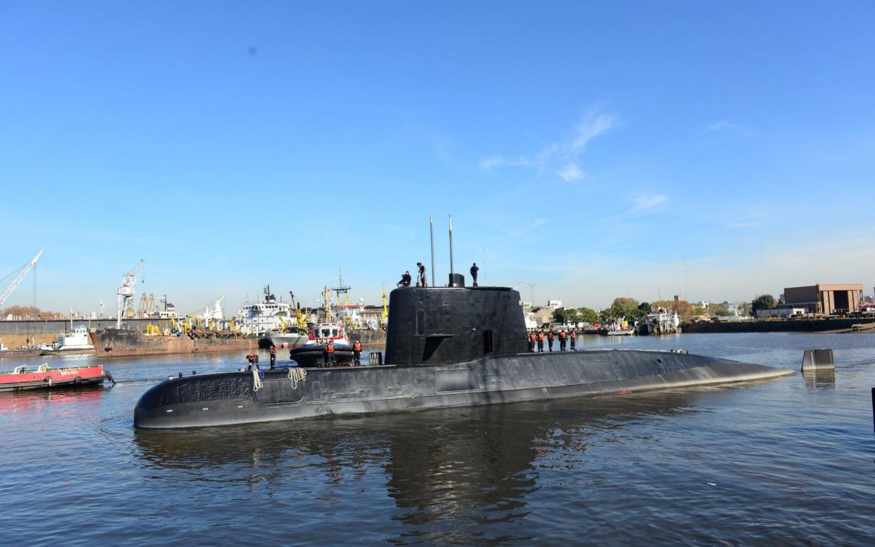 The Argentine military submarine ARA San Juan and crew are seen leaving the port of Buenos Aires, Argentina June 2, 2014 - REUTERS