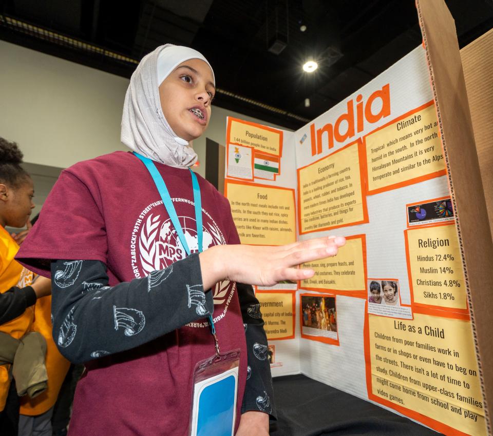 Garland Elementary School fourth-grader Bushra Emran speaks about her project on India at the Milwaukee Public Schools World Fair.
