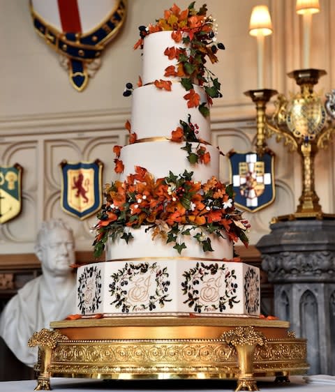 The wedding cake created by Sophie Cabot for the wedding of Princess Eugenie to Jack Brooksbank seen in St. George's Hall at Windsor Castle - Credit: Matt Crossick/ PA