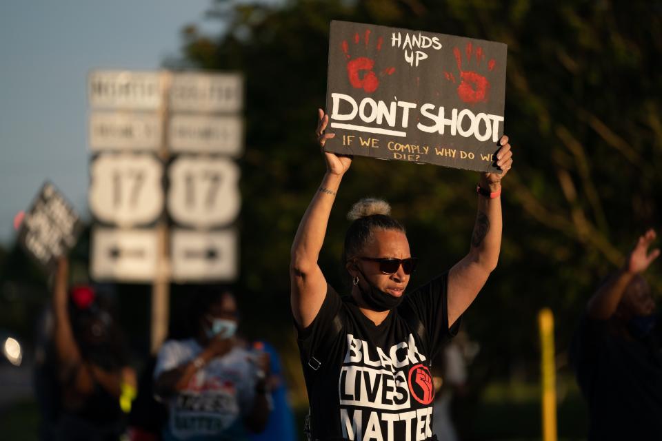 <p>ELIZABETH CITY, NC - MAY 11: Protestors march in the street after a news conference addressing police video footage of the shooting death of Andrew Brown Jr. on May 11, 2021 in Elizabeth City, North Carolina. Brown was shot and killed by officers from the Pasquotank County Sheriff's Office on April 21. </p> ((Photo by Sean Rayford/Getty Images))