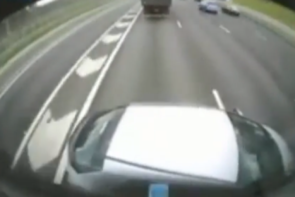 Lorry shunts car along motorway for 100 yards