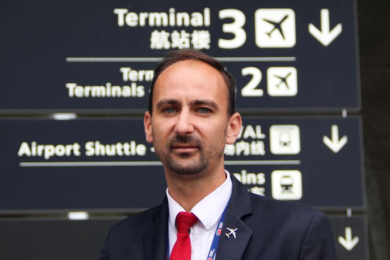 French airport worker Loris Foreman poses during an interview with Reuters at the Paris-Charles de Gaulle airport in Roissy