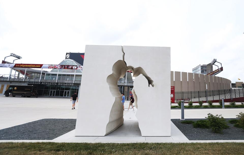 The Jack Trice "Breaking Barriers" statue is seen front of Jack Trice Stadium Friday, Aug. 4 in Ames.