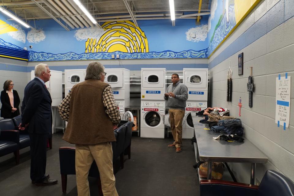 Opportunity Hub executive director Hoyt Bynum in the facility's laundry room. The Spartanburg County Foundation presented Bynum and the Opportunity Hub with a 'Just Because' grant on Valentine's Day 2023.