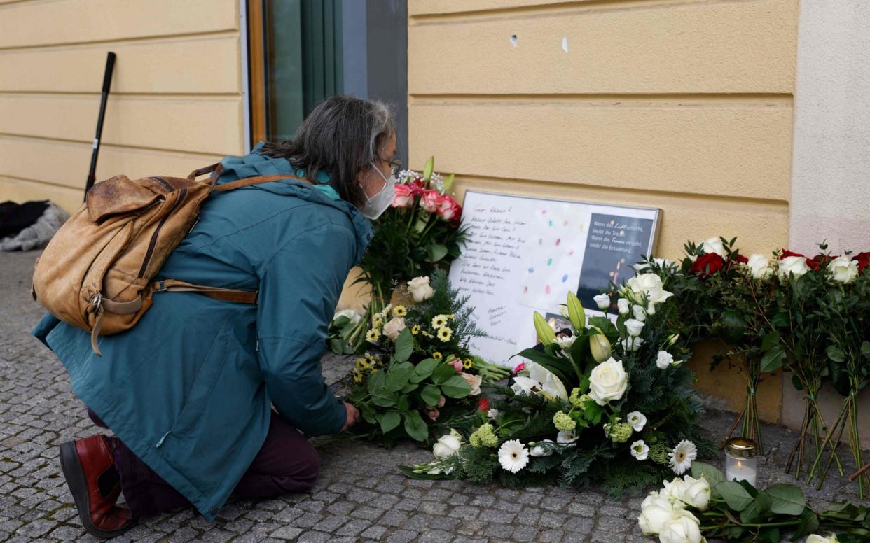 A makeshift memorial was made for the victims in front of the Oberlin care centre in Potsdam - ODD ANDERSEN/AFP via Getty Images