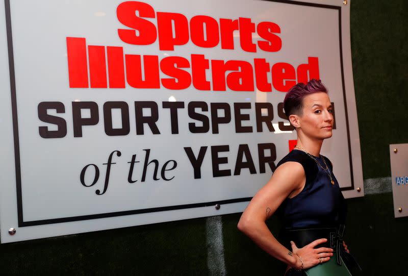 Megan Rapinoe poses as she arrives for Sports Illustrated Sportsperson of the Year Awards in New York