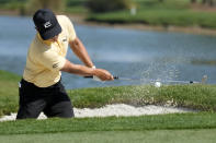 Justin Suh hits from a bunker onto the third green during the final round of the Honda Classic golf tournament, Sunday, Feb. 26, 2023, in Palm Beach Gardens, Fla. (AP Photo/Lynne Sladky)