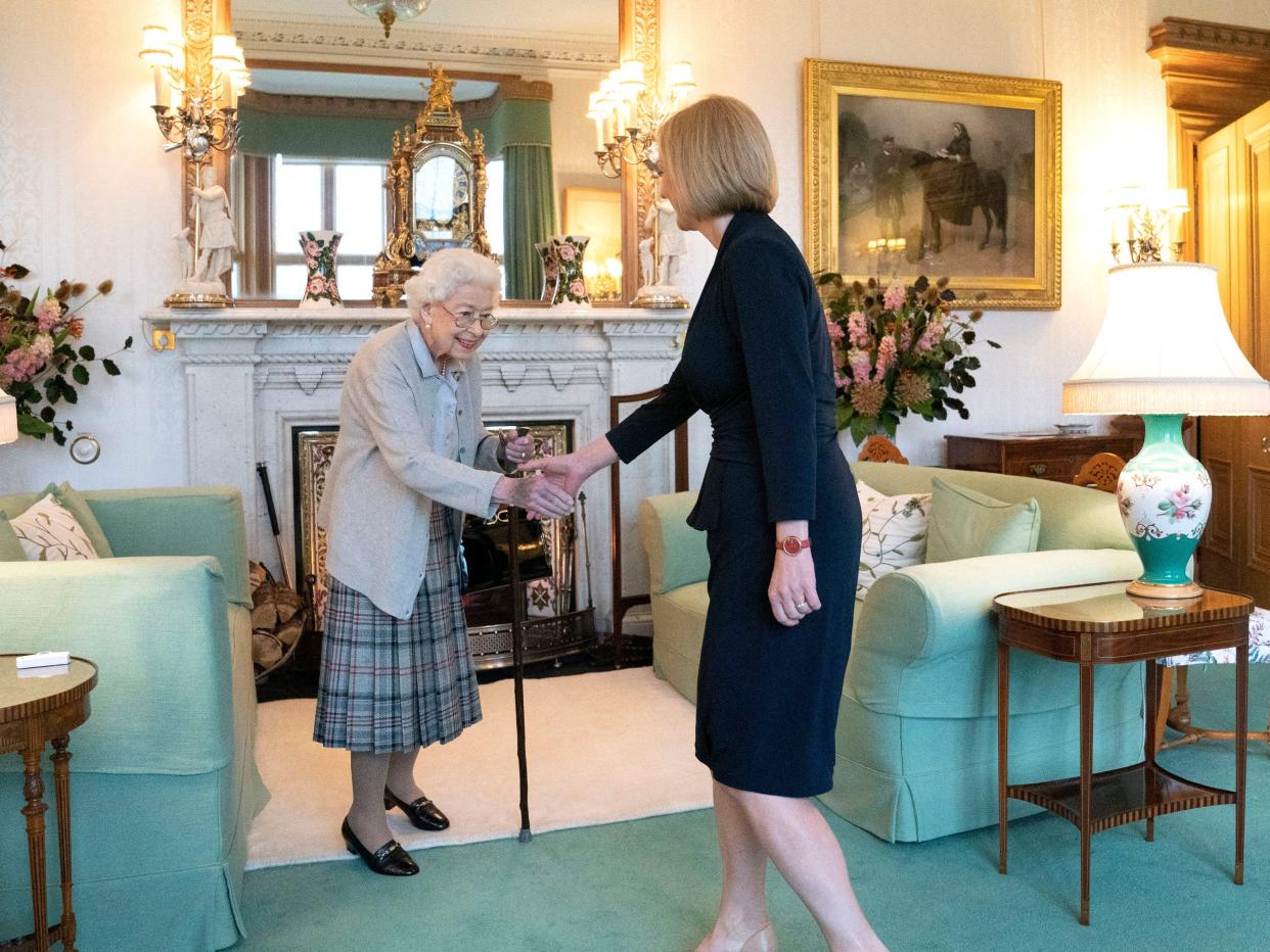 Britain's Queen Elizabeth II and new Conservative Party leader and Britain's Prime Minister-elect Liz Truss meet at Balmoral Castle in Ballater, Scotland, on September 6, 2022, where the Queen invited Truss to form a Government.