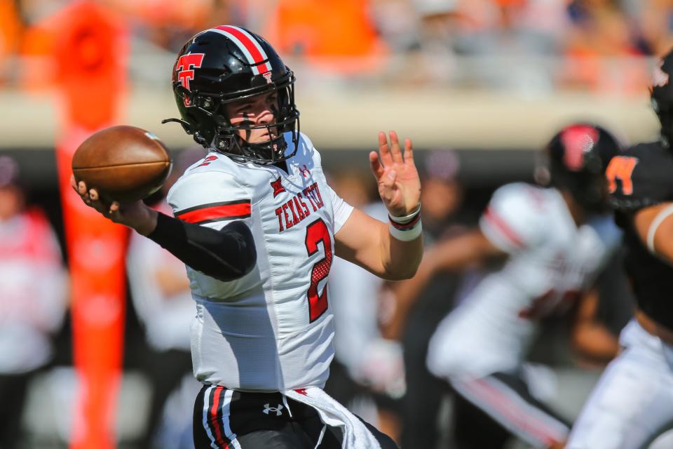 Texas Tech's Behren Morton (2) throws the ball in the first quarter during a college football game between the Oklahoma State Cowboys and the Texas Tech Red Raiders at Boone Pickens Stadium in Stillwater, Okla., Saturday, Oct. 8, 2022.