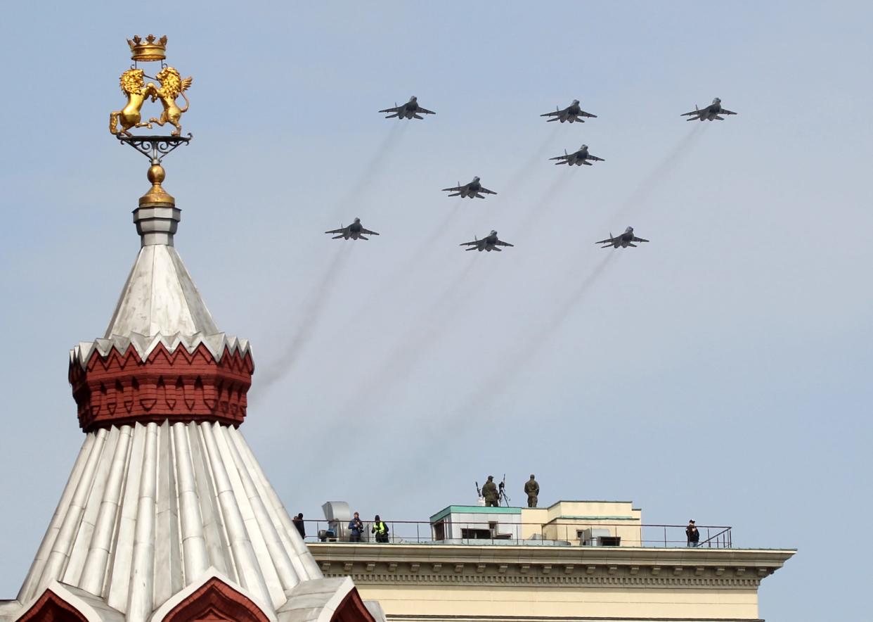 Russian Mikoyan MIG-29 jet fighters fly in the shape of the letter "Z", a symbol in support of the military invasion on Ukraine, fly over Red Square during the Victory Day Parade main rehearsals, on May 7, 2022 in Moscow, Russia.