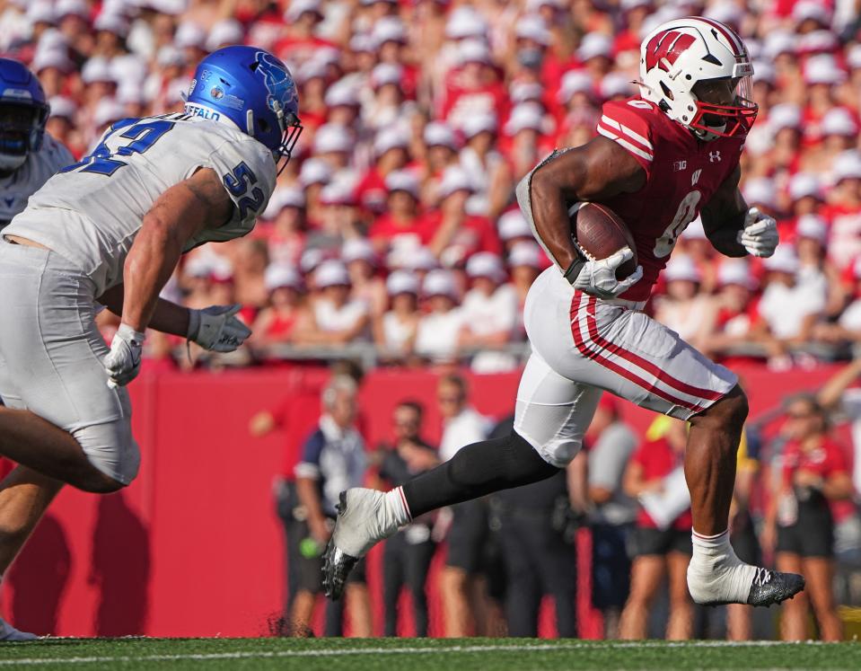 Wisconsin running back Braelon Allen (0) picks up 37 yards during the third quarter of their game Saturday, September 2, 2023 at Camp Randall Stadium in Madison, Wis. Wisconsin beat Buffalo 38-17.