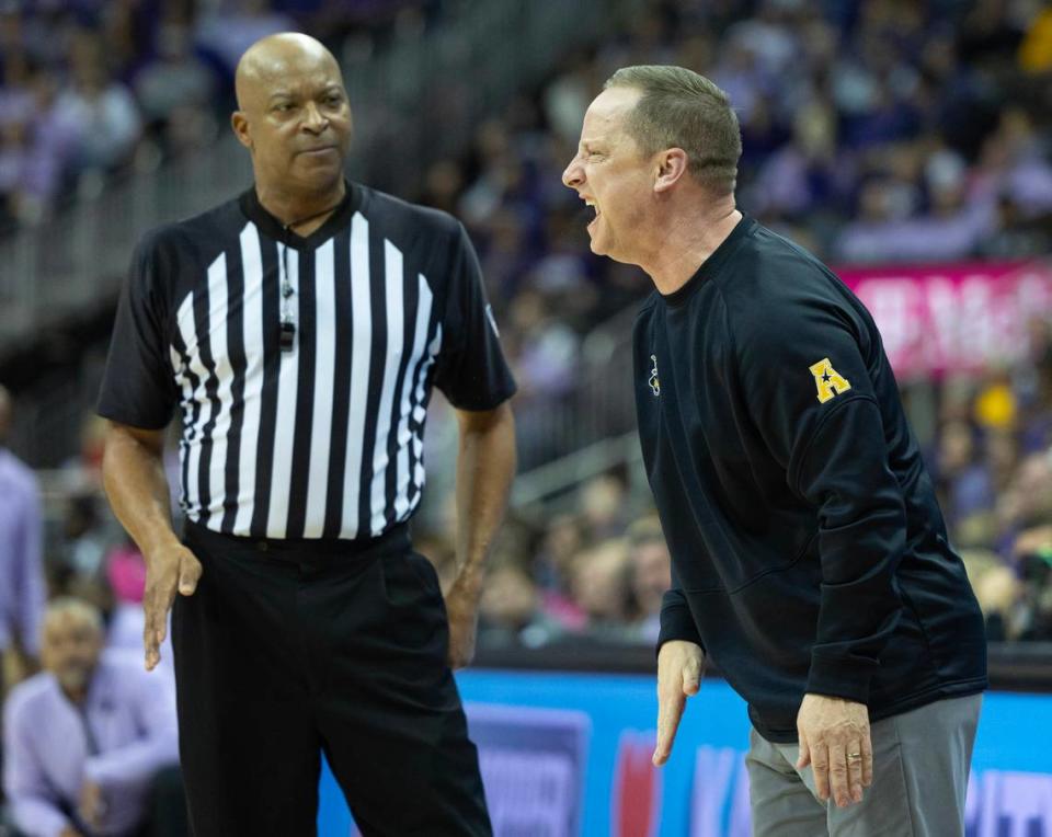 Wichita State coach Paul Mills takes issue with the officiating during the second half of Kansas State’s 69-60 win over the Shockers on Thursday night at the T-Mobile Center in Kansas City.