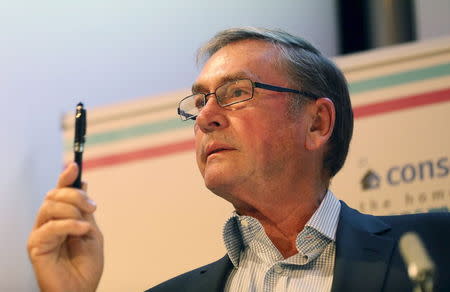 Former deputy chairman of the Conservative party Michael Ashcroft presents data from his latest general election polling in central London, Britain, in this March 4, 2015 file photo. REUTERS/Paul Hackett/Files