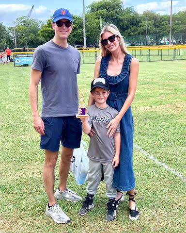 <p>Ivanka Trump Instagram</p> Jared Kushner and Ivanka Trump with their son Theodore James Kushner on a field.