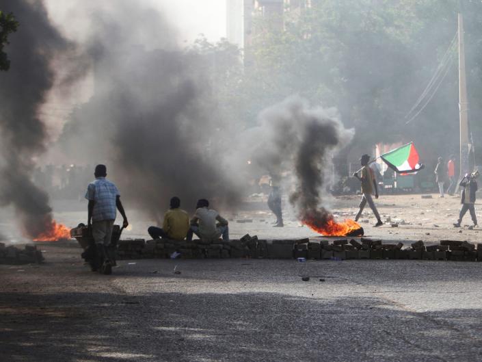 Sudanese demonstrators march in Khartoum, Sudan, Monday, Dec. 26, 2022 to protest a deal signed between the country's main pro-democracy group and its ruling generals, who seized power in an October 2021 coup.