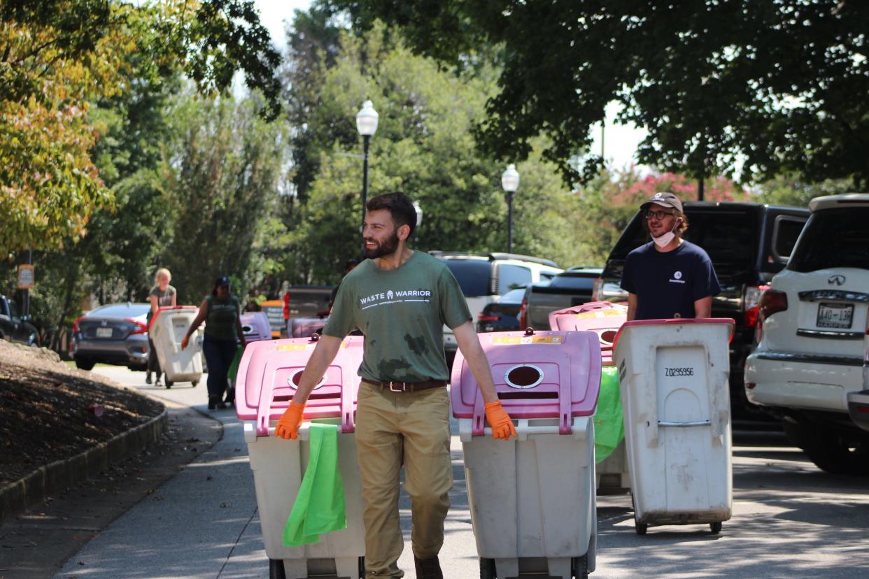 "Waste warriors" at the University of Tennessee at Knoxville collect plastic waste from Neyland Stadium to be recycled.