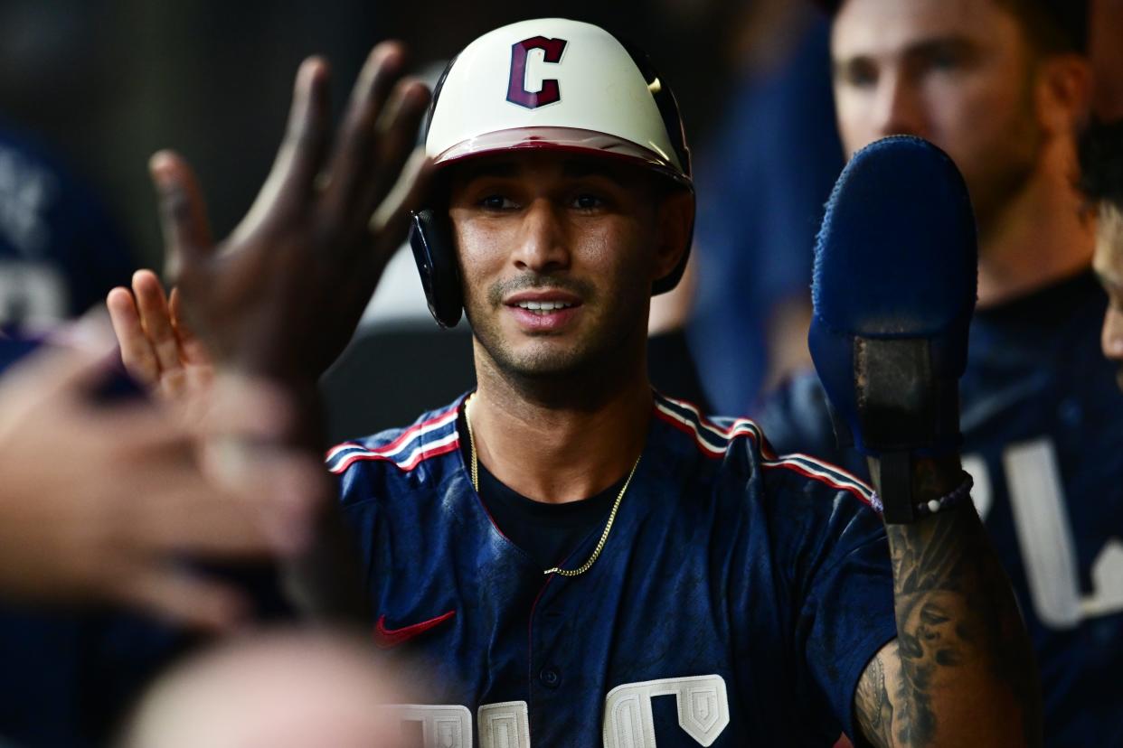 Aug 23, 2024; Cleveland, Ohio, USA; Cleveland Guardians shortstop Brayan Rocchio (4) celebrates after scoring during the third inning against the Texas Rangers at Progressive Field. Mandatory Credit: Ken Blaze-USA TODAY Sports