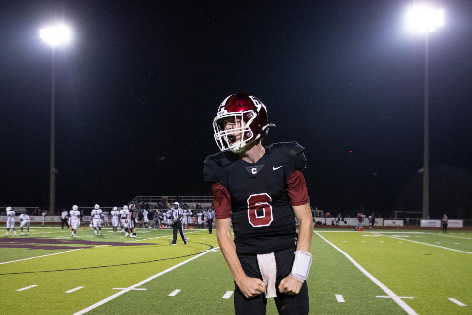 Chiles quarterback Trent Hartung (6) celebrates after the team defeated Madison County High School Friday, Sept. 17, 2021.