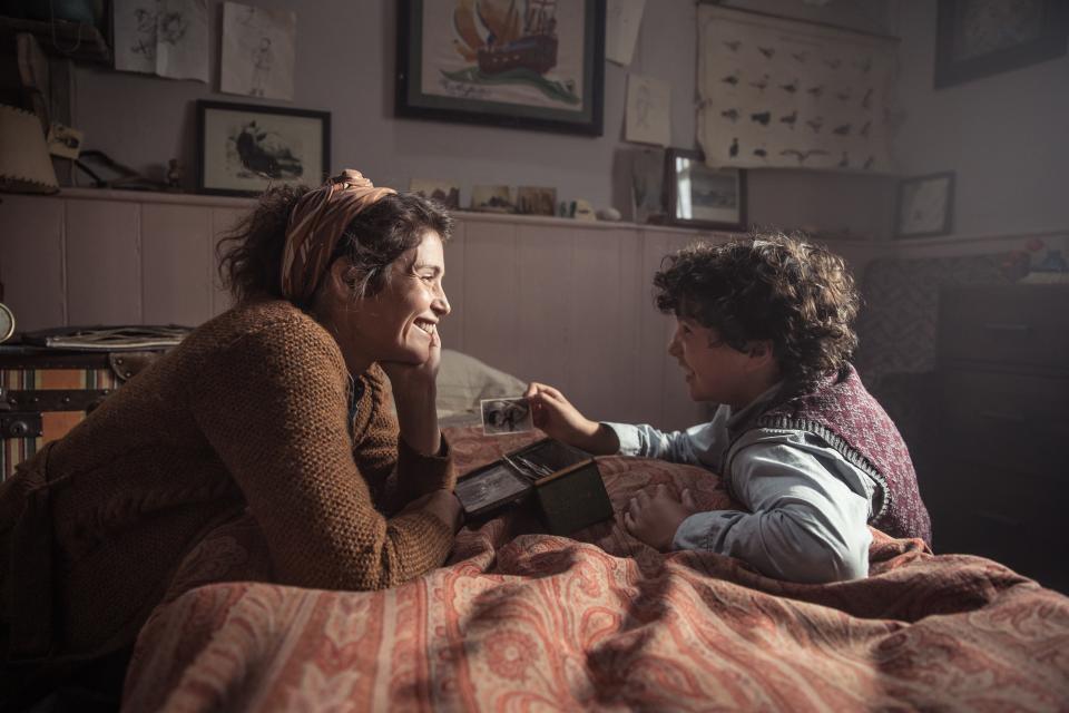 A reclusive English writer (Gemma Arterton) takes in a young boy (Lucas Bond) evacuated from London in the World War II drama "Summerland."