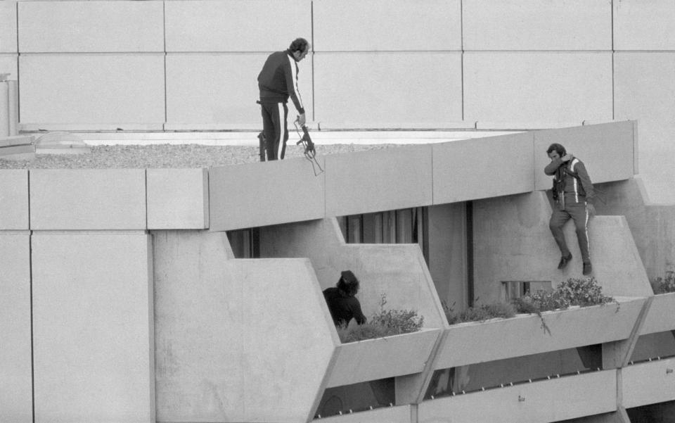 German police take up position outside the apartments where Israeli athletes and coaches were being held hostage at the 1972 Munich Olympics