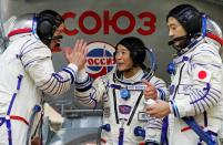 Cosmonaut Alexander Misurkin and space flight participants Yusaku Maezawa and Yozo Hirano attend a training session ahead of the expedition to the ISS, in Star City