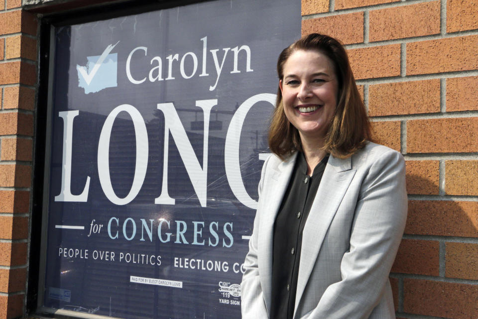 Carolyn Long, the Democratic candidate in the Third Congressional District race, outside her campaign office in Vancouver, Wash. (AP Photo/Rachel La Corte)