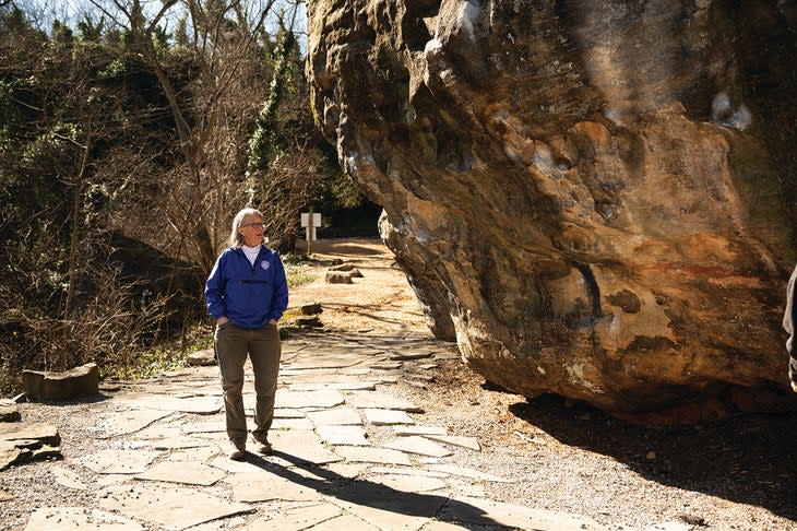 <span class="article__caption">Robyn Carlton, CEO of Lookout Mountain Conservancy, at one of the newly landscaped blocks of the Wauhatchie Boulde</span> (Photo: Nathalie DuPre)