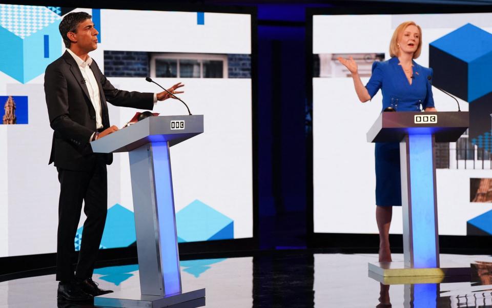 Rishi Sunak and Liz Truss are pictured during last night's Tory leadership debate hosted by the BBC  - Jacob King/AFP