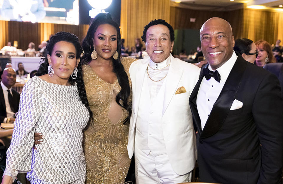 (L-R) Frances Glandney, Vivica A. Fox, Smokey Robinson and Byron Allen attend Byron Allen's Oscar Gala at Beverly Wilshire, A Four Seasons Hotel on March 12, 2023 in Beverly Hills, California.