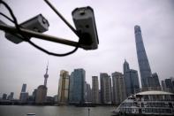 Surveillance cameras are seen at Lujiazui financial district of Pudong