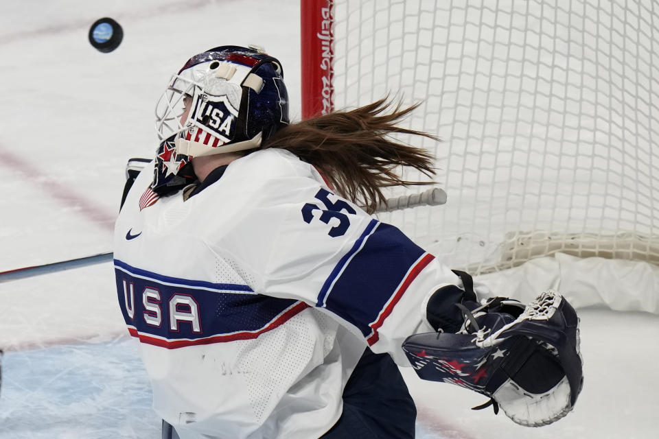 United States goalkeeper Maddie Rooney blocks a shot against Finland during a preliminary round women's hockey game at the 2022 Winter Olympics, Thursday, Feb. 3, 2022, in Beijing. (AP Photo/Petr David Josek)