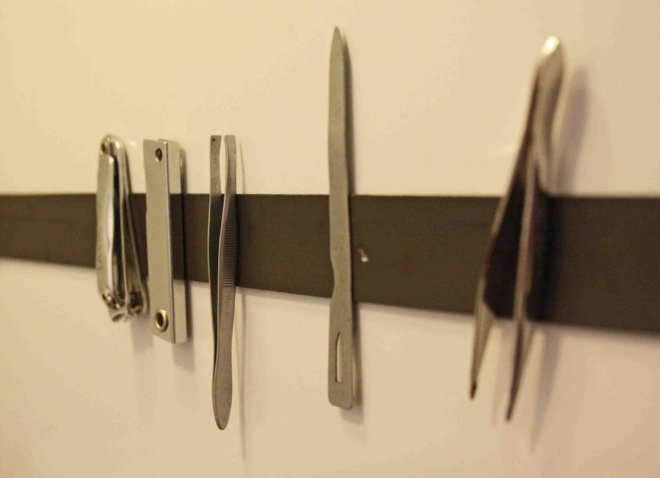 <body> <p>Sick of your space-devoid medicine cabinet? Give yourself room to spare by creating instant storage from bargain <a rel="nofollow noopener" href=" http://www.bobvila.com/articles/uses-of-magnets/#.VrJUp2Tysy4?bv=yahoo" target="_blank" data-ylk="slk:magnetic strips;elm:context_link;itc:0;sec:content-canvas" class="link ">magnetic strips</a> adhered to the cabinet door. When covered with hair pins, trimmers, and nail clippers, these genius organizers are sure to attract order and repel clutter!</p> <p><strong>Related: <a rel="nofollow noopener" href=" http://www.bobvila.com/slideshow/boring-bathroom-7-fixes-for-an-old-medicine-cabinet-48190#.VrvX5WTysy4?bv=yahoo" target="_blank" data-ylk="slk:Boring Bathroom? 7 Fixes for an Old Medicine Cabinet;elm:context_link;itc:0;sec:content-canvas" class="link ">Boring Bathroom? 7 Fixes for an Old Medicine Cabinet</a> </strong> </p> </body>