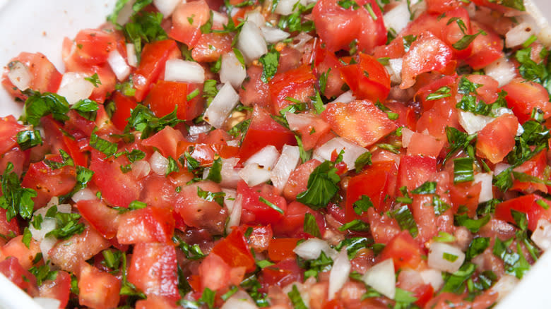 Tomatoes, cilantro, peppers, and onion