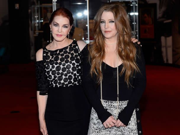 PHOTO: Priscilla Presley and her daughter Lisa Marie Presley attend the ribbon-cutting ceremony during the grand opening of Graceland Presents ELVIS: The Exhibition - The Show - The Experience, Apr. 23, 2015, in Las Vegas. (Bryan Steffy/WireImage via Getty Images)