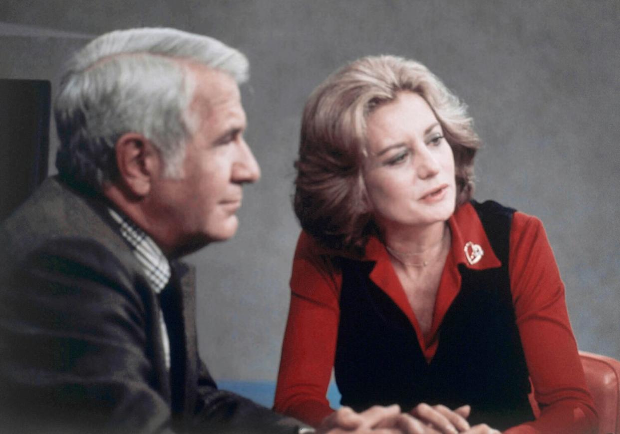 Barbara Walters with co-anchor Harry Reasoner on Oct. 4, 1976.