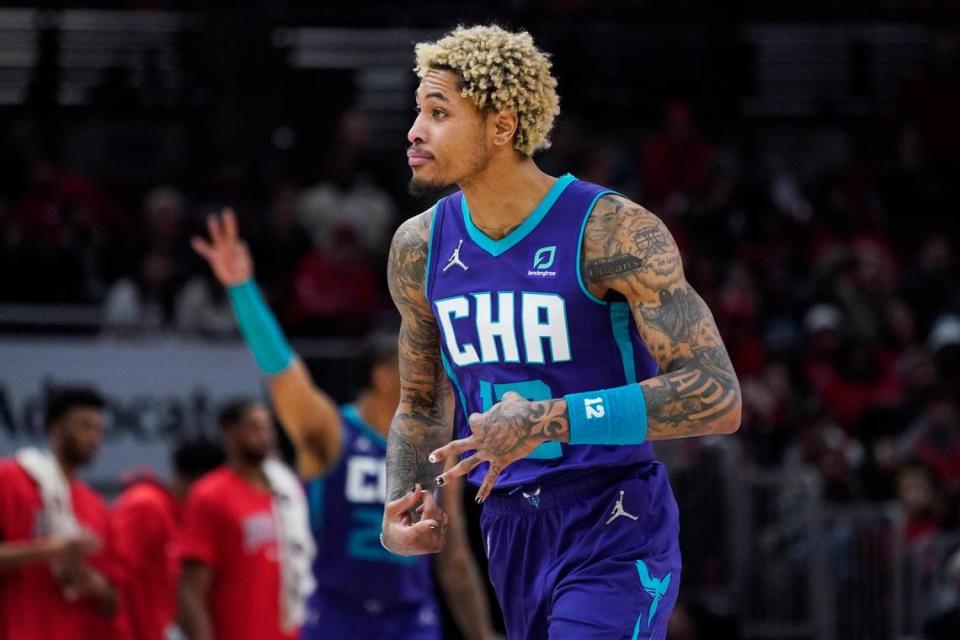 Charlotte Hornets guard Kelly Oubre Jr., reacts after a three-point basket during the second half of an NBA basketball game against the Chicago Bulls in Chicago, Friday, April 8, 2022. The Hornets won 133-117. (AP Photo/Nam Y. Huh)