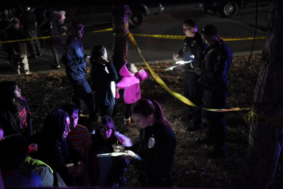 <p>Customers being interviewed by Police after a shooting in Walmart in Thornton, Colo., on Nov. 1, 2017. (Photo: Joe Amon/The Denver Post via Getty Images) </p>