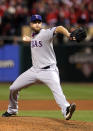 ST LOUIS, MO - OCTOBER 27: Scott Feldman #39 of the Texas Rangers pitches in the 10th inning during Game Six of the MLB World Series against the St. Louis Cardinals at Busch Stadium on October 27, 2011 in St Louis, Missouri. (Photo by Ezra Shaw/Getty Images)