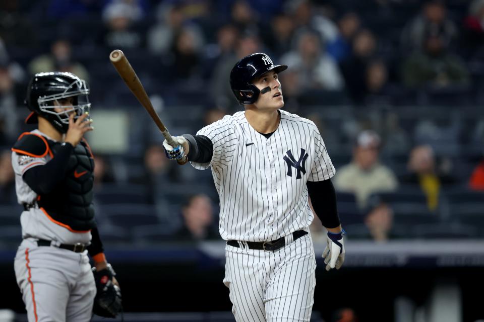 Yankees first baseman Anthony Rizzo watches one of the three home runs he hit April 26 against the Orioles clear the fence. He leads the majors with nine homers.