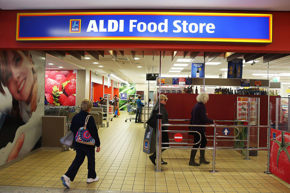 Customers enter an Aldi store in Sydney. Source: AAP