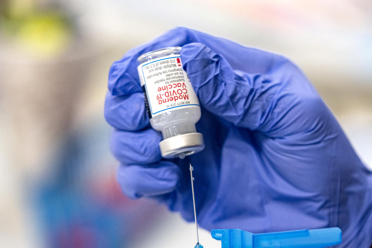 SAN ANTONIO, TX - MARCH 29: A nurse fills up a syringe with the Moderna Covid-19 vaccine at a vaccination site at a senior center on March 29, 2021 in San Antonio, Texas. Texas has opened up all vaccination eligibility to all adults starting today. Texas has had a slower roll out than some states and with the increase in eligibility leaders are hoping more and more citizens get vaccinated. (Photo by Sergio Flores/Getty Images)