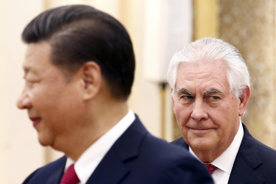 FILE - In this March 19, 2017 file photo, China's President Xi Jinping, left, stands near U.S. State of Secretary Rex Tillerson during a meeting at the Great Hall of the People in Beijing, China. North Korea has a criticism of U.S. President Donald Trump he probably wasn’t expecting: He’s too much like Barack Obama. Just before Tillerson arrived in Tokyo, the North launched several ballistic missiles into the Sea of Japan. While he was still in China, it conducted a test of what it called a “revolutionary” new type of engine for its rockets. On Wednesday, March 22, 2017, it appears to have conducted more missile tests from the eastern port city of Wonsan, though they reportedly failed. (Thomas Peter/Pool Photo via AP)