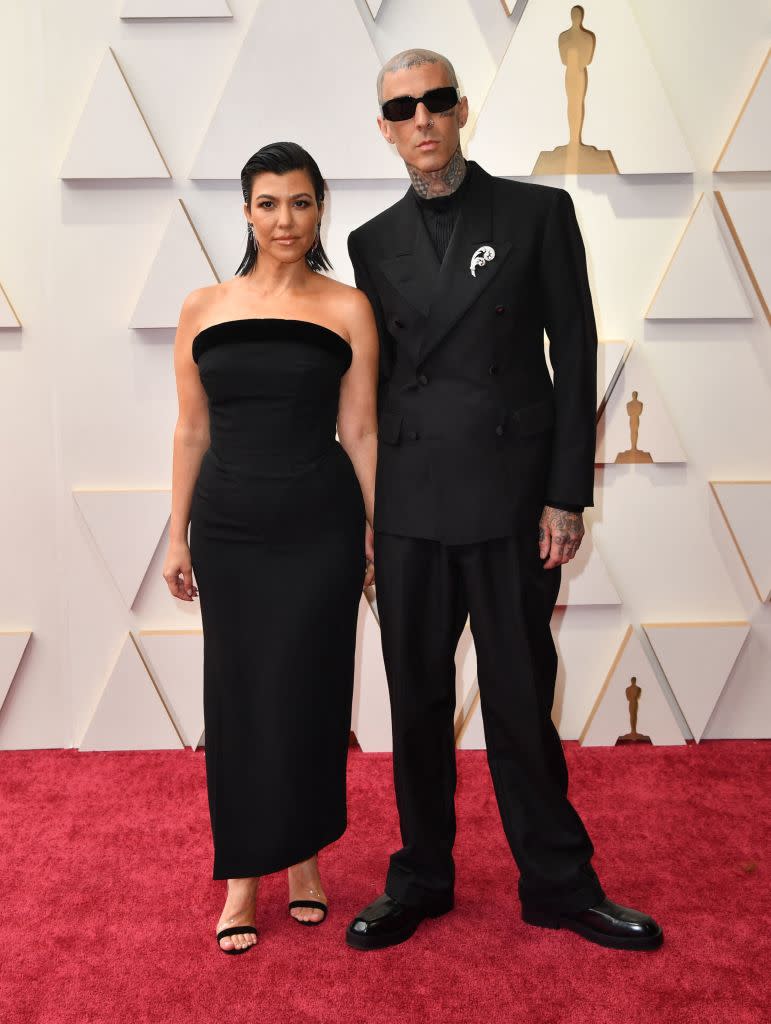 Kourtney Kardashian and Travis Barker on the Oscars red carpet.