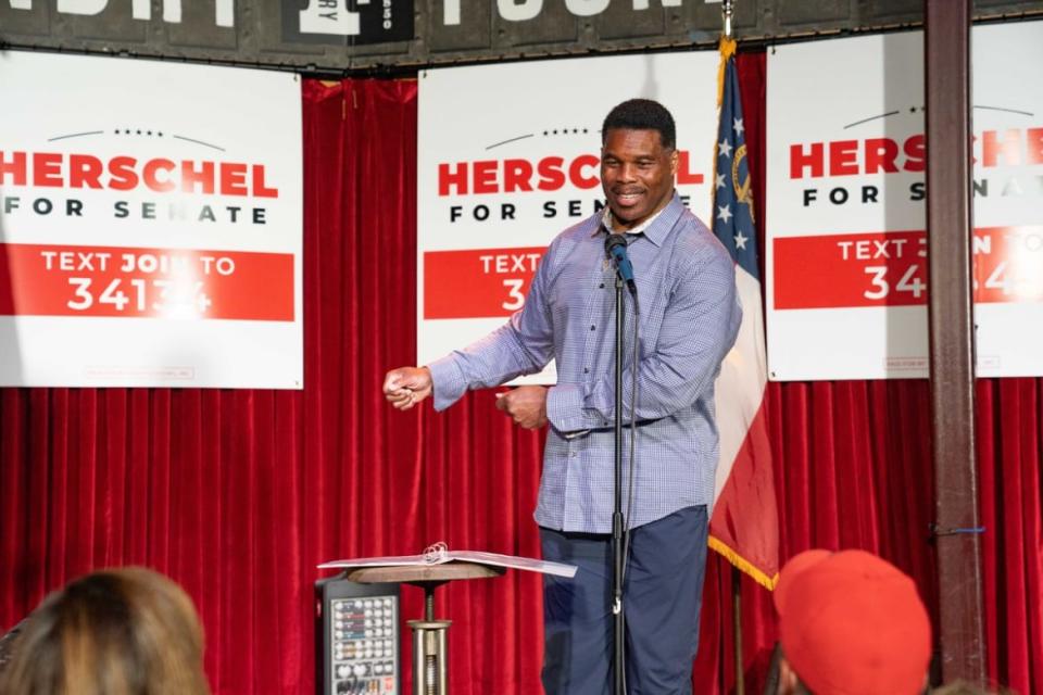 <div class="inline-image__caption"><p>ATHENS, GA—Heisman Trophy winner and Republican candidate for U.S. Senate Herschel Walker speaks at a rally on May 23, 2022.</p></div> <div class="inline-image__credit">Megan Varner/Getty Images</div>