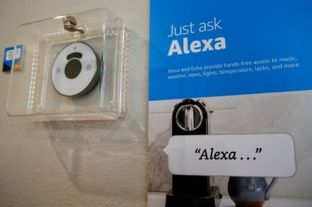 FILE PHOTO: Prompts on how to use Amazon's Alexa personal assistant are seen in an Amazon ‘experience center’ in Vallejo