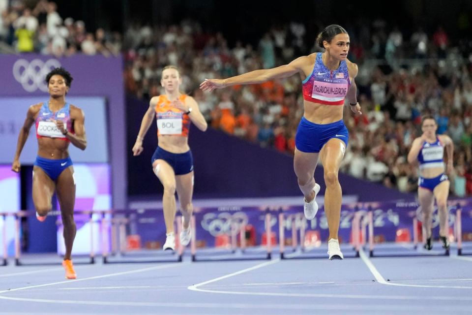 Sydney McLaughlinLevrone smashes 400m hurdles world record in stunning