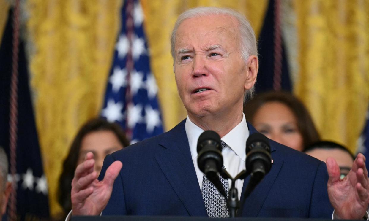 <span>Joe Biden unveils his plan at the White House on Tuesday.</span><span>Photograph: Drew Angerer/AFP/Getty Images</span>